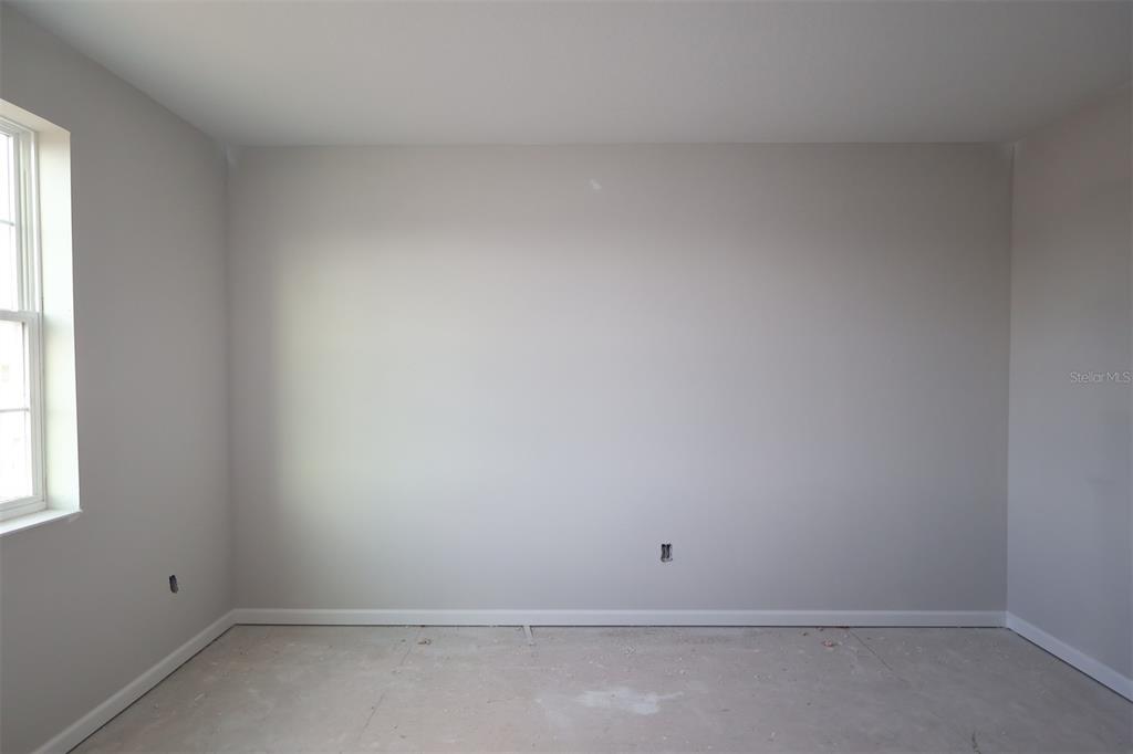 5291 High Line Drive St. Cloud, FL 34771 - Photo 19 of 24 a room that has a window