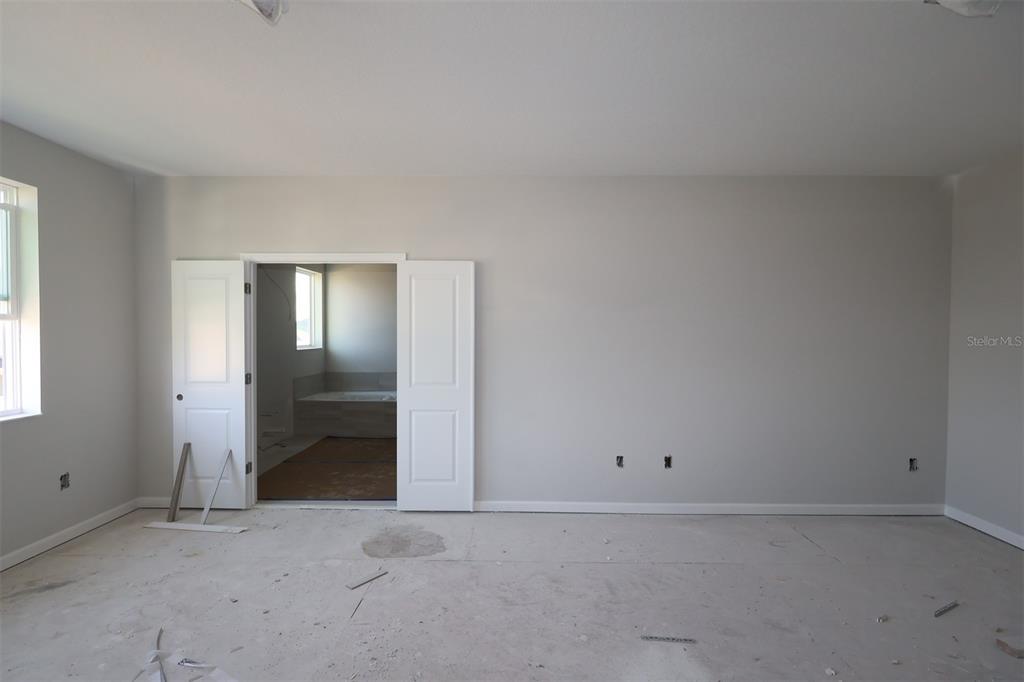 5291 High Line Drive St. Cloud, FL 34771 - Photo 6 of 24 a view of an empty room and window