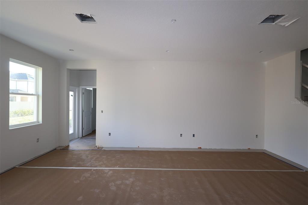 5291 High Line Drive St. Cloud, FL 34771 - Photo 7 of 24 a view of an empty room with a window