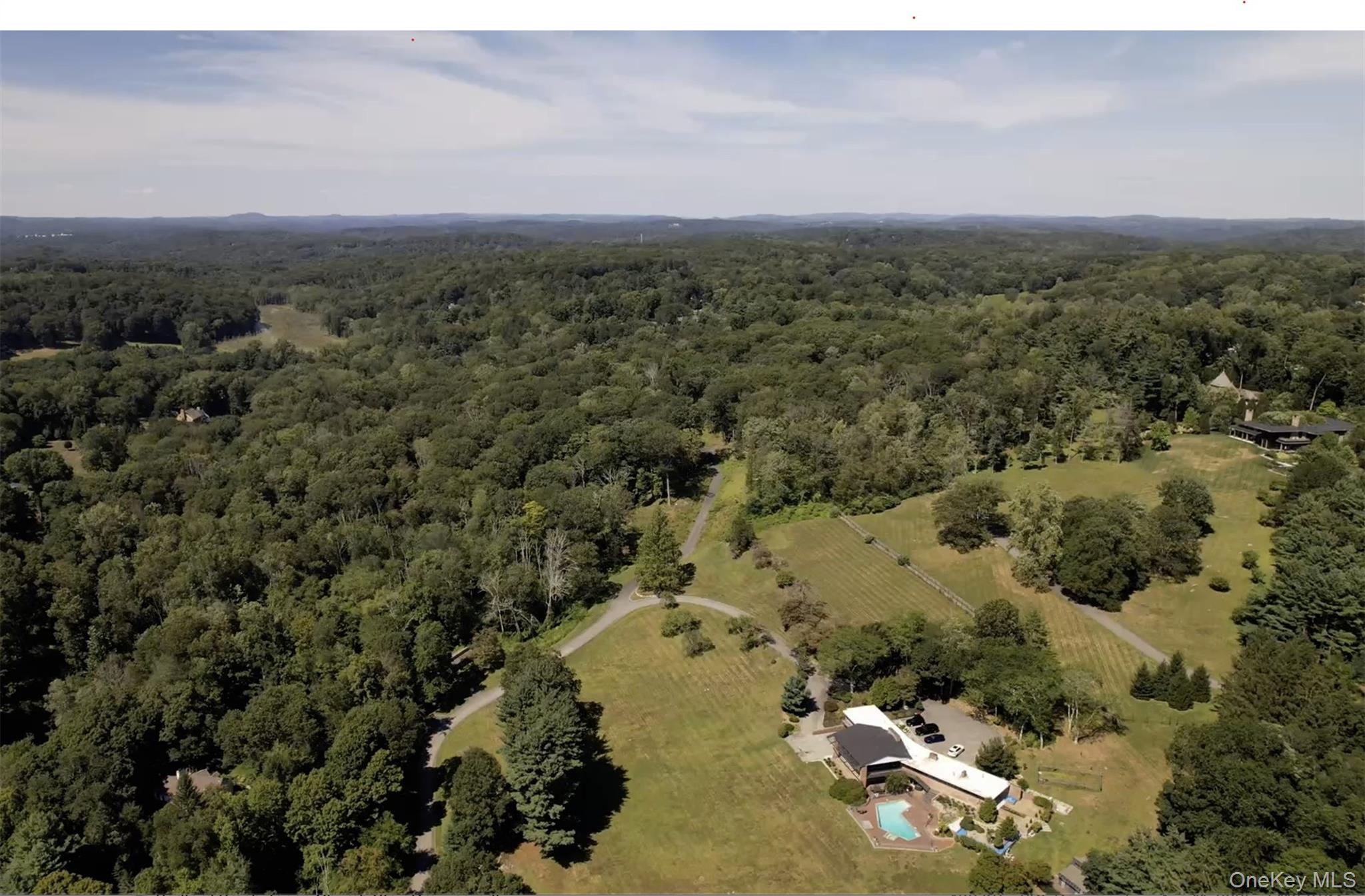 572 Cross River Road Katonah, NY 10536 - Photo 1 of 1 an aerial view of a houses with a yard
