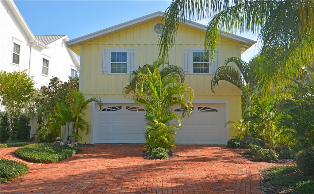 1207 Bayshore Boulevard Indian Rocks Beach, FL 33785 - Photo 1 of 1 a view of a house with a yard
