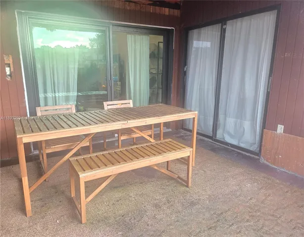 a view of a terrace with a garden