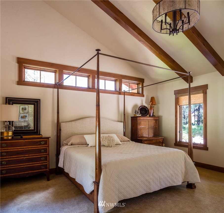 51 Rushing Water Lane Cle Elum, WA 98922 - Photo 12 of 28 a bedroom with a bed and a window