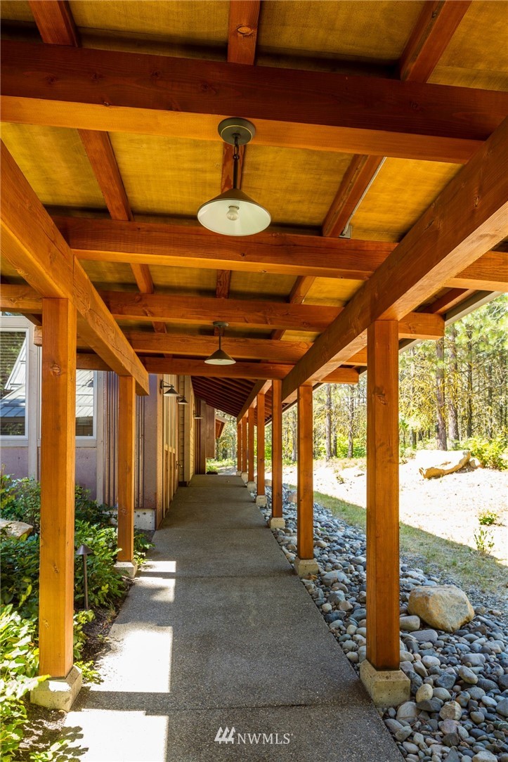 51 Rushing Water Lane Cle Elum, WA 98922 - Photo 15 of 28 a view of a porch with a table and chairs