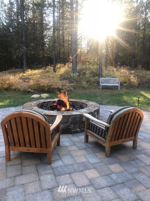 51 Rushing Water Lane Cle Elum, WA 98922 - Photo 16 of 28 a view of a yard with sitting area and furniture