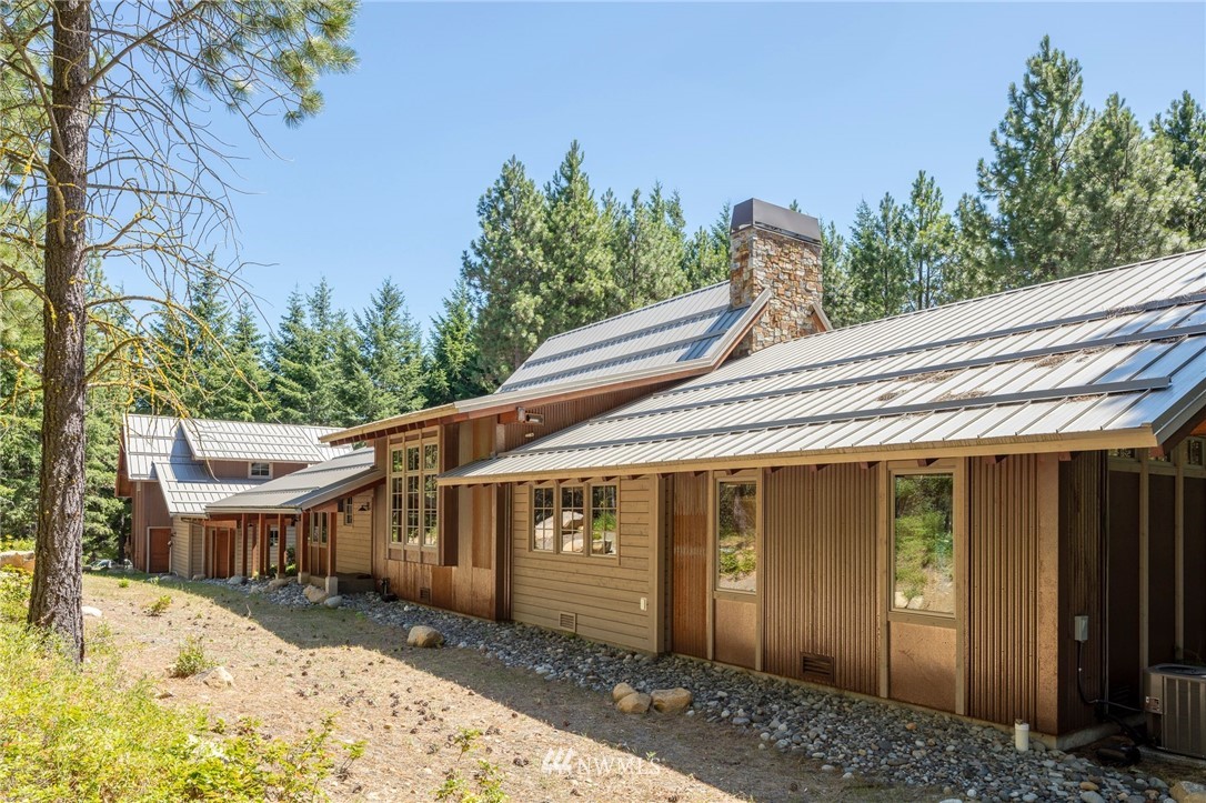 51 Rushing Water Lane Cle Elum, WA 98922 - Photo 19 of 28 a front view of a house with a yard