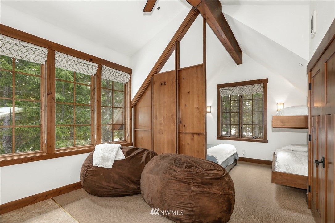 51 Rushing Water Lane Cle Elum, WA 98922 - Photo 21 of 28 a living room with furniture and large windows