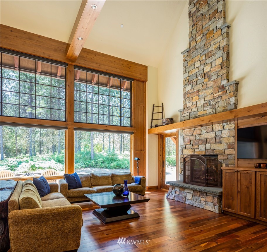 51 Rushing Water Lane Cle Elum, WA 98922 - Photo 5 of 28 a living room with fireplace furniture and a large window