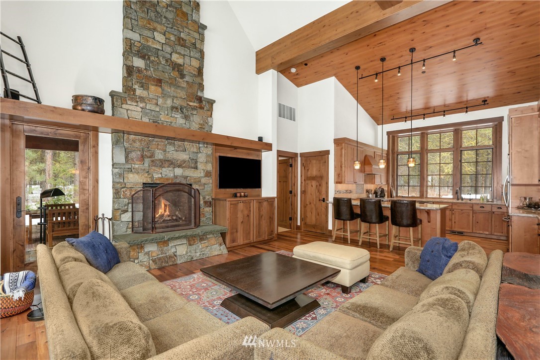 51 Rushing Water Lane Cle Elum, WA 98922 - Photo 7 of 28 a living room with furniture and a fireplace