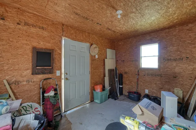 a view of livingroom with furniture and windows