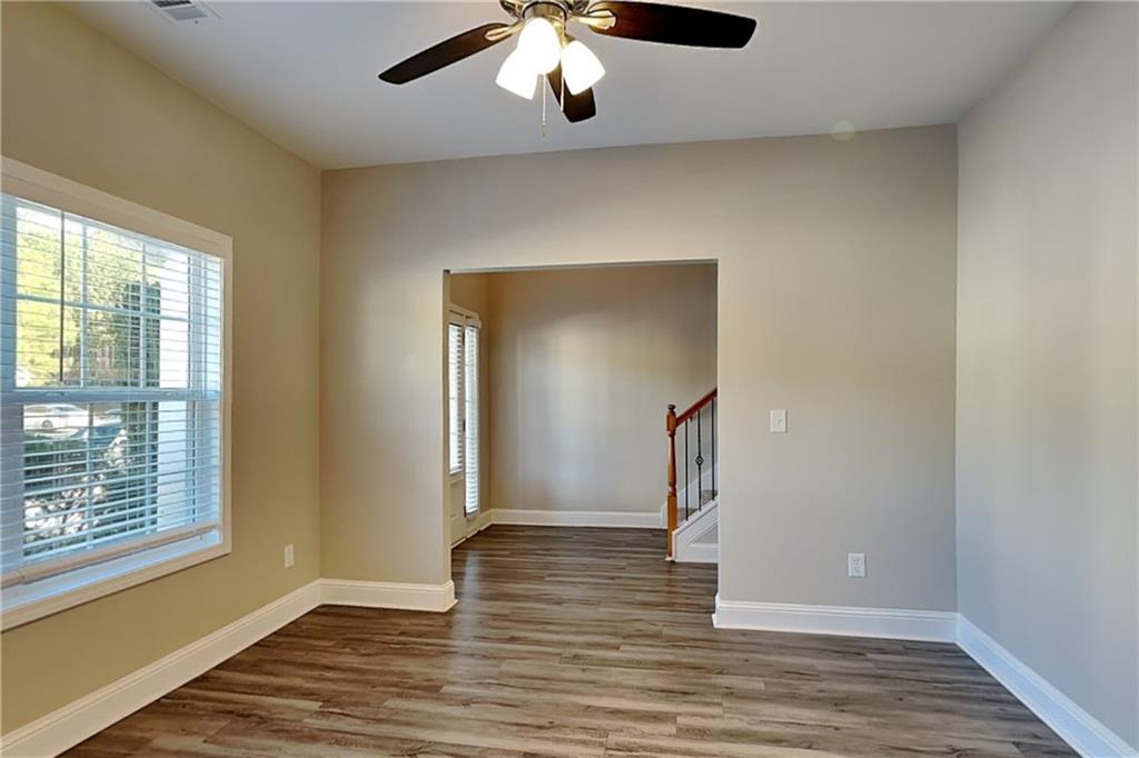 227 Brightondale Boulevard Dallas, GA 30132 - Photo 23 of 26 a view of empty room with wooden floor and fan