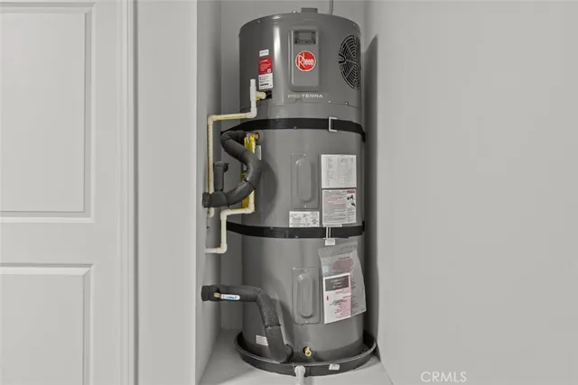 a room with water heater and storage