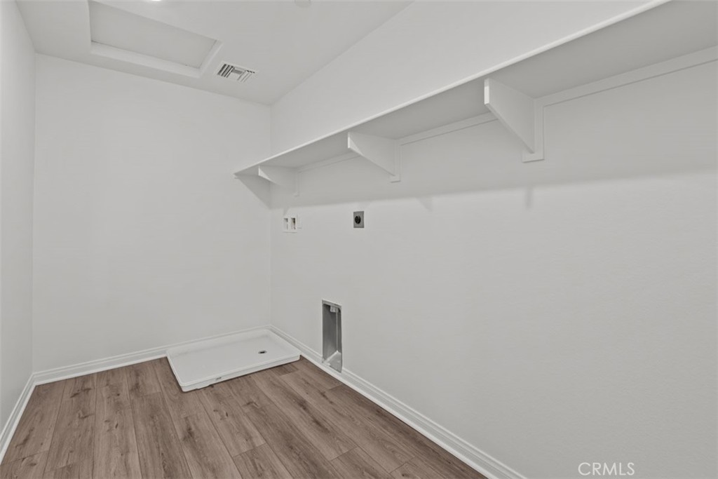 1213 Butterfly Way Banning, CA 92220 - Photo 14 of 18 a view of an empty walk in closet