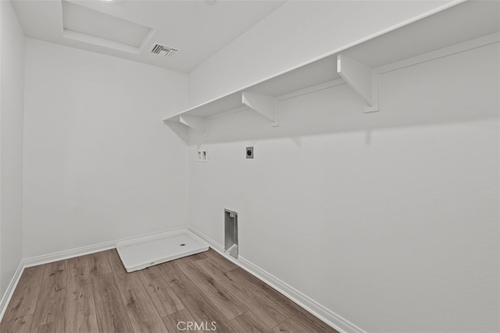 1213 Butterfly Way Banning, CA 92220 - Photo 14 of 18 a view of an empty walk in closet