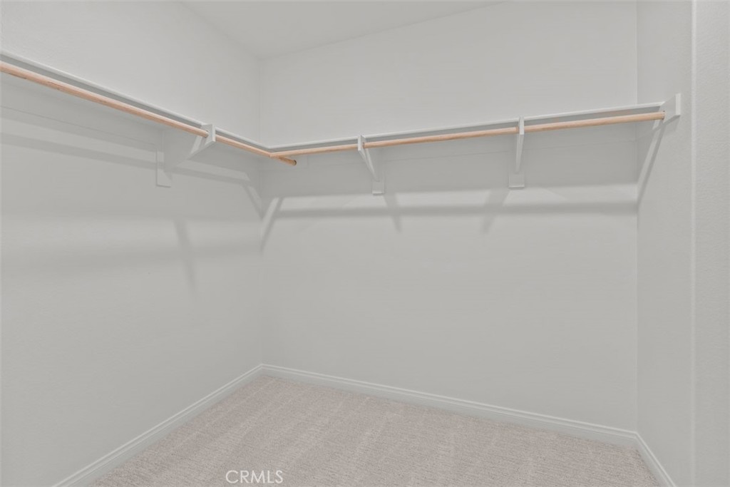 1213 Butterfly Way Banning, CA 92220 - Photo 17 of 18 a view of an empty walk in closet