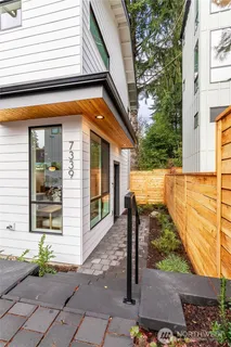 a kitchen with a sink a stove and refrigerator