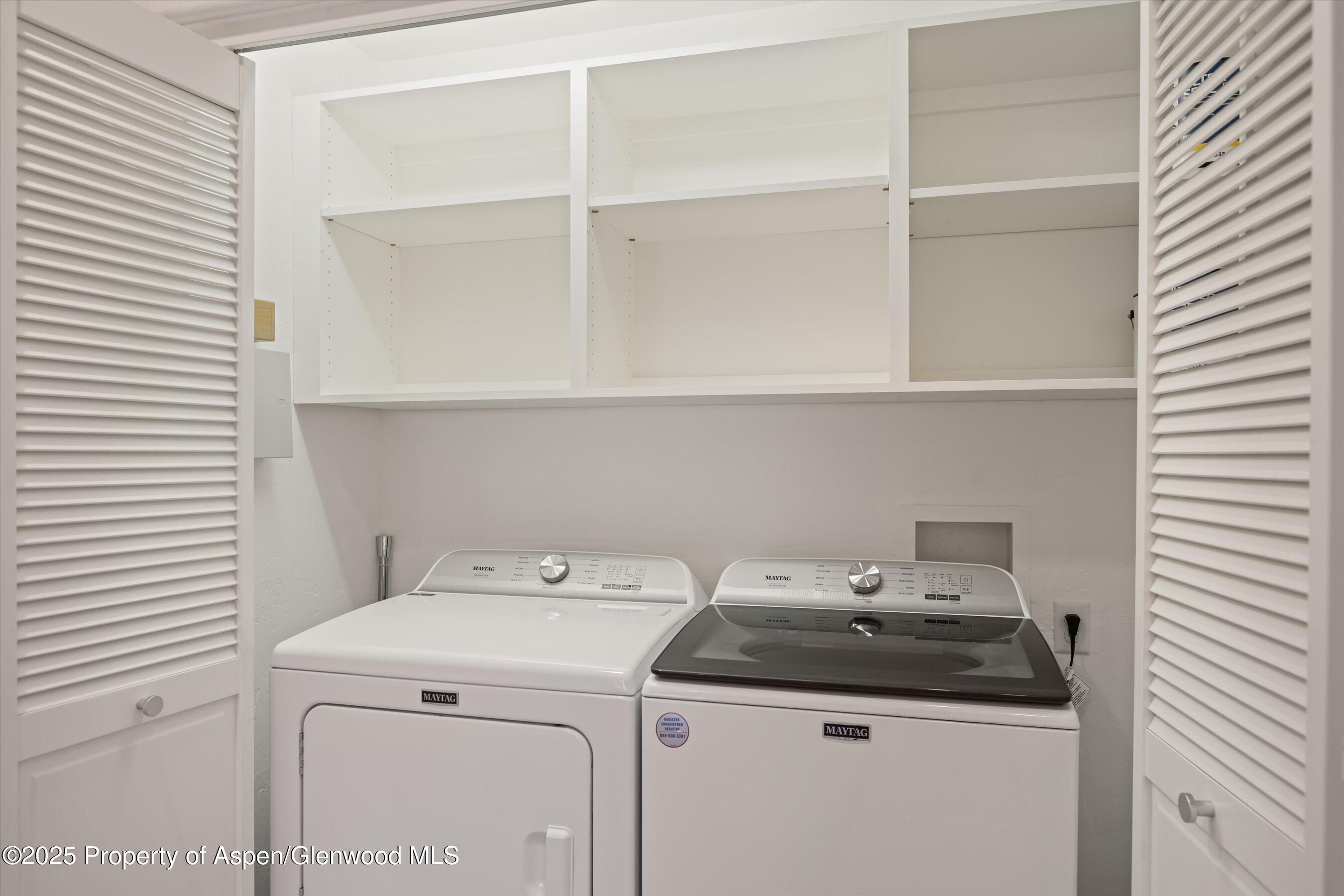 302 Wild Spring Lane Basalt, CO 81621 - Photo 19 of 28 a utility room with dryer and washer