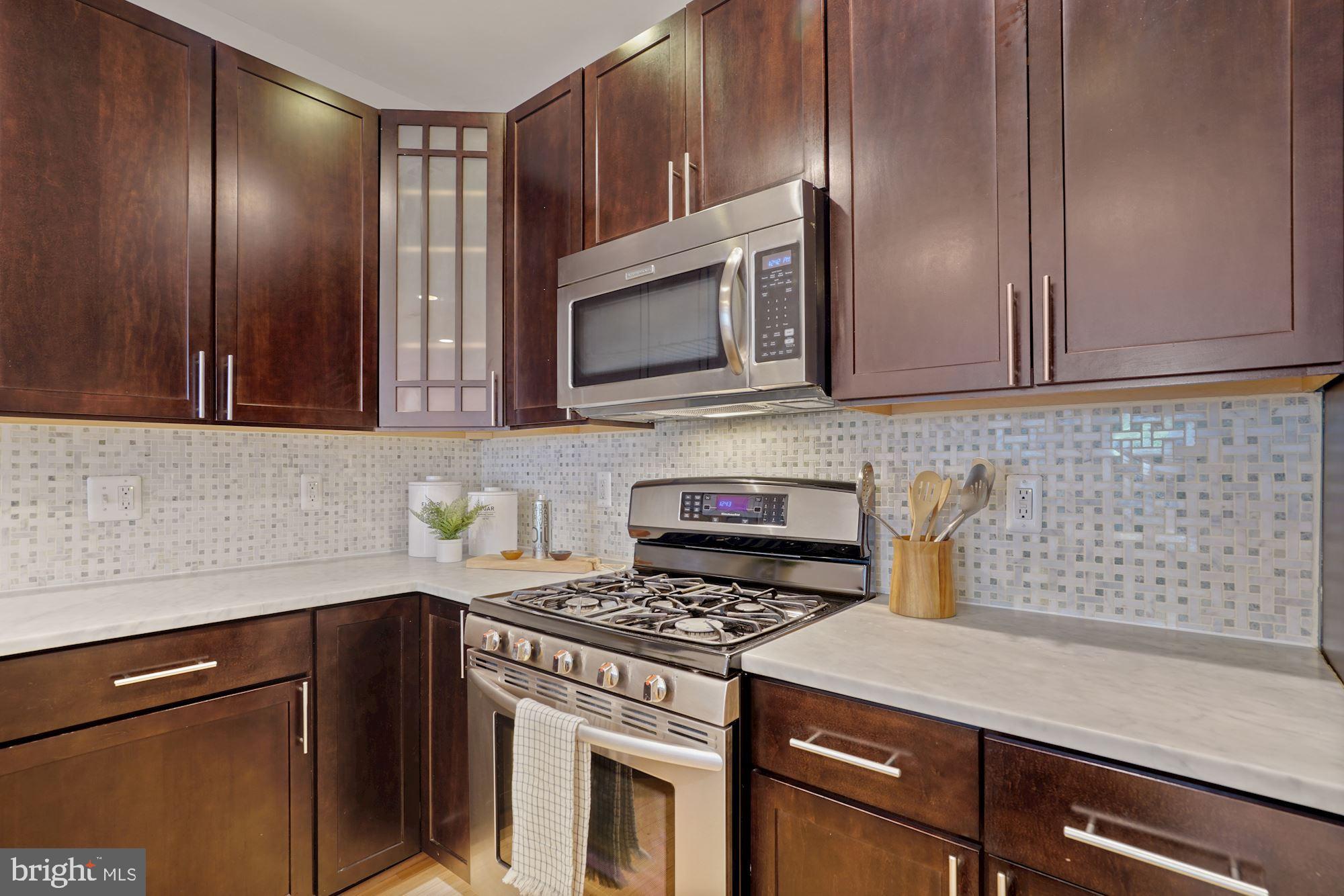 3546 13th Street Northwest, Unit 1 Washington, DC 20010 - Photo 6 of 18 Beautiful finishes with plenty of cabinet space