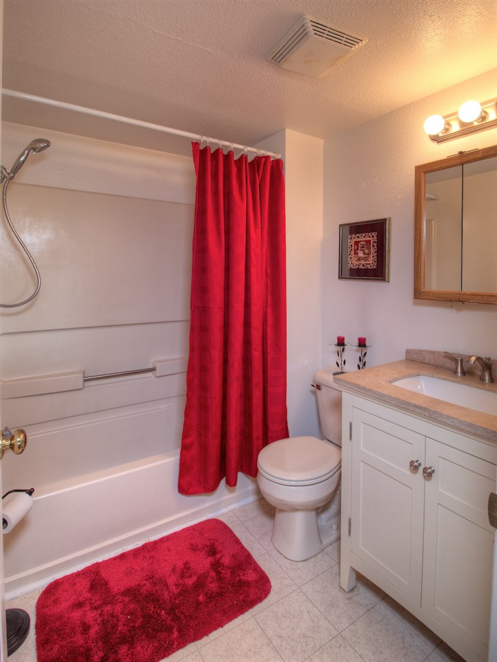 1754 L L 1/2 Road Fruita, CO 81521 - Photo 12 of 22 a bathroom with a toilet a sink and bathtub