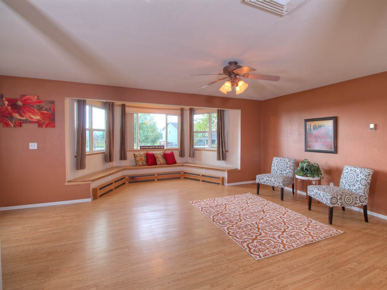 1754 L L 1/2 Road Fruita, CO 81521 - Photo 3 of 22 a living room with furniture and a wooden floor