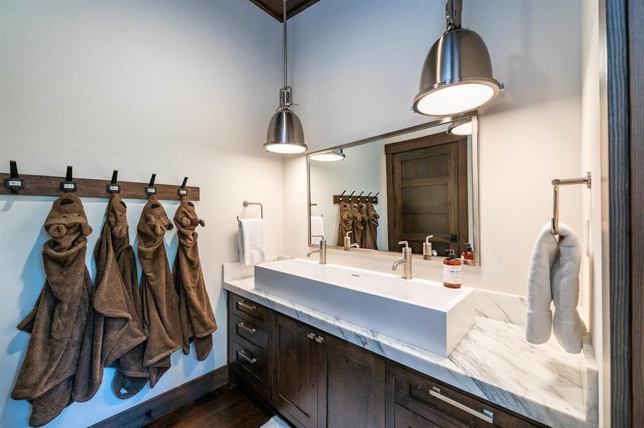 10617 Carson Range Road Truckee, CA 96161 - Photo 20 of 21 a view of a kitchen with a sink and a wooden floor