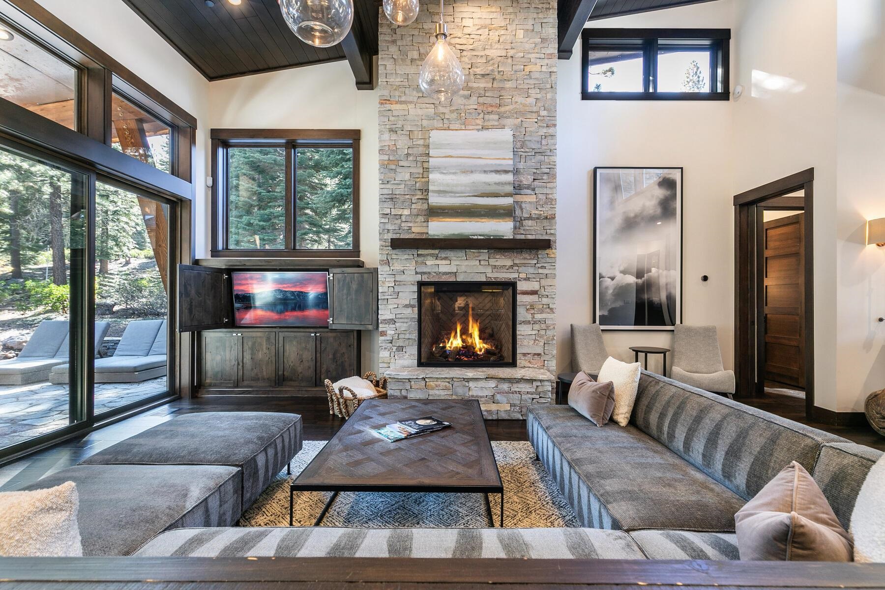 10617 Carson Range Road Truckee, CA 96161 - Photo 4 of 21 a living room with furniture fireplace and flat screen tv