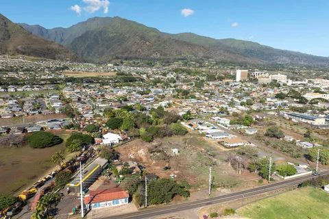 a view of a city with mountain