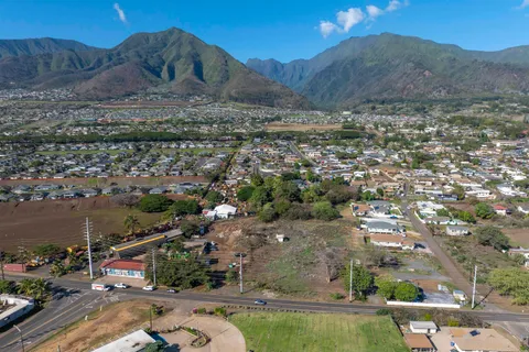 an aerial view of a house with a garden