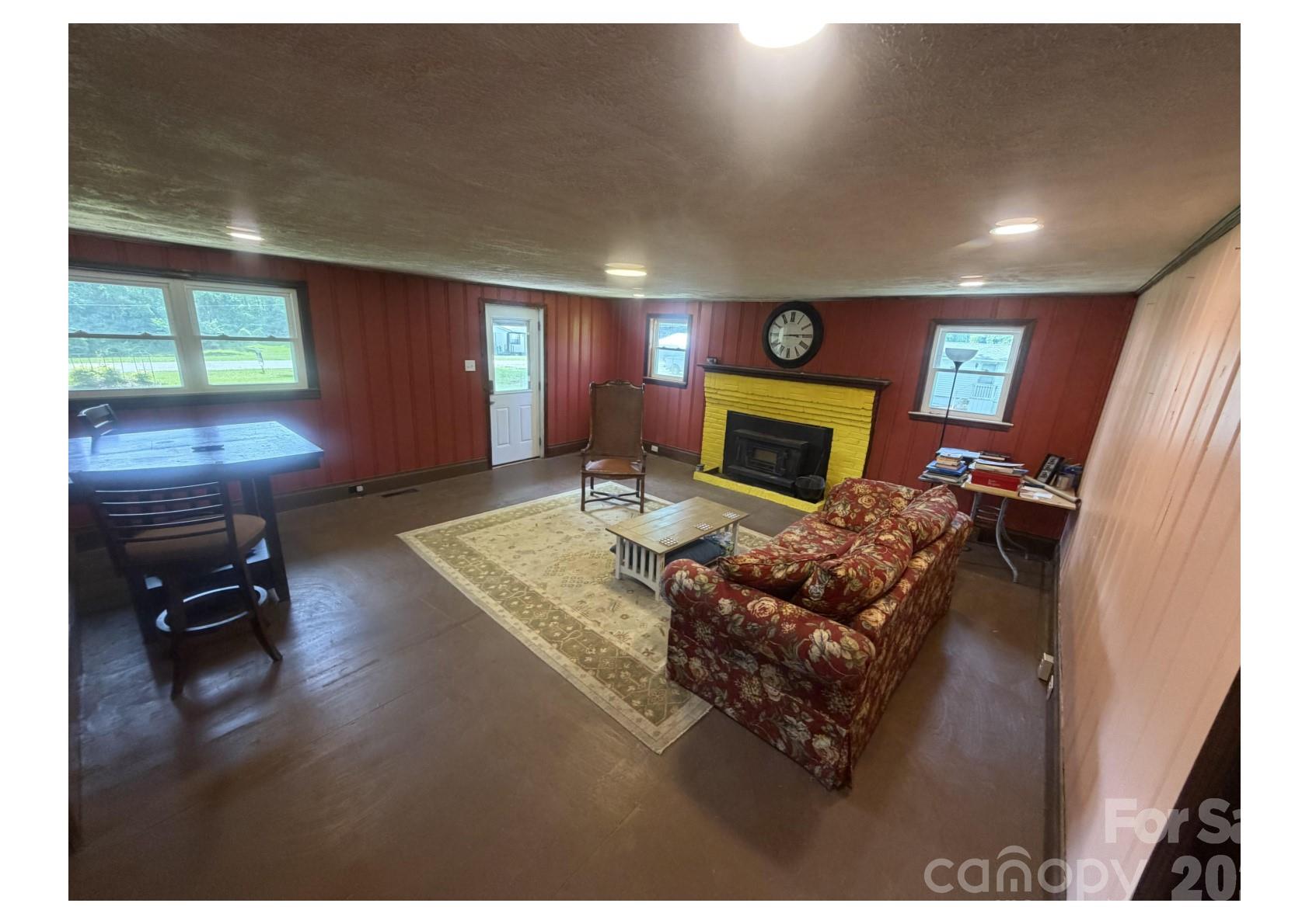 341 Lake Road Rockingham, NC 28379 - Photo 12 of 25 a living room with furniture and a flat screen tv