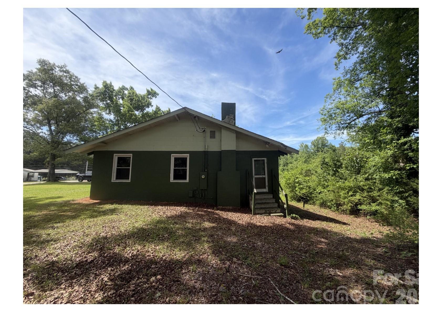 341 Lake Road Rockingham, NC 28379 - Photo 19 of 25 a front view of a house with a yard