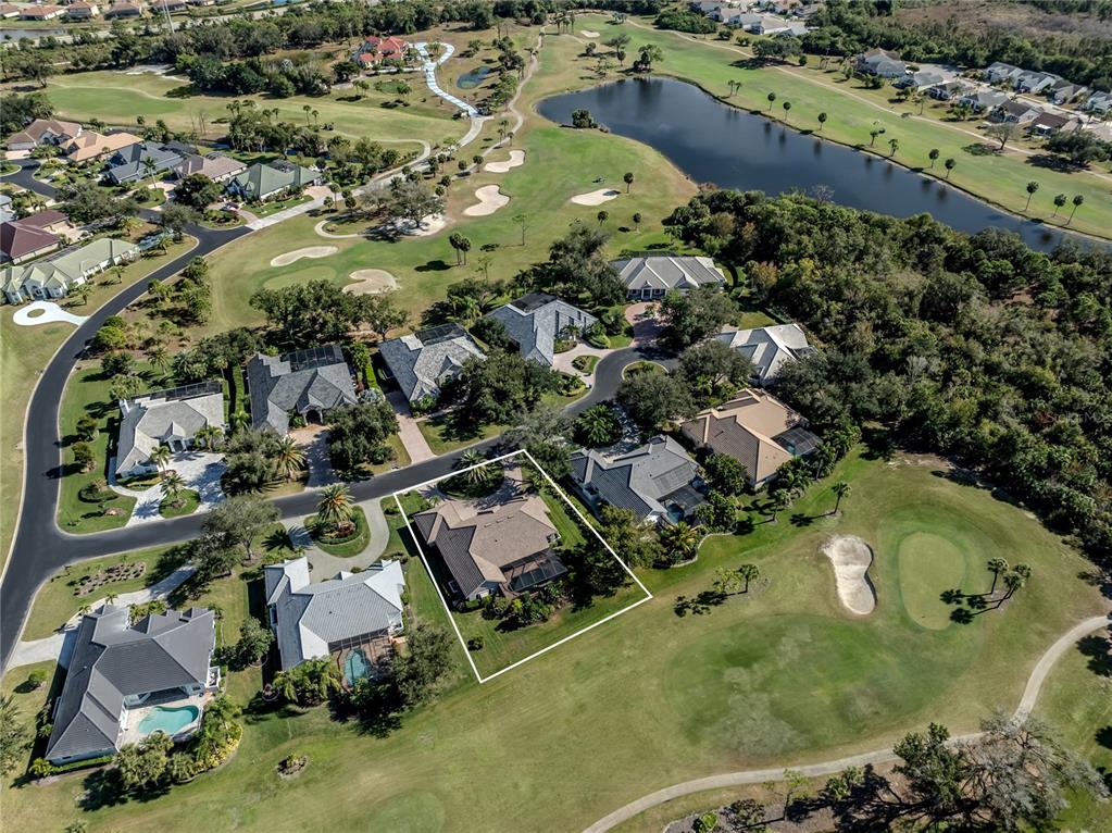 406 Trenwick Lane Venice, FL 34293 - Photo 34 of 60 an aerial view of residential houses with outdoor space