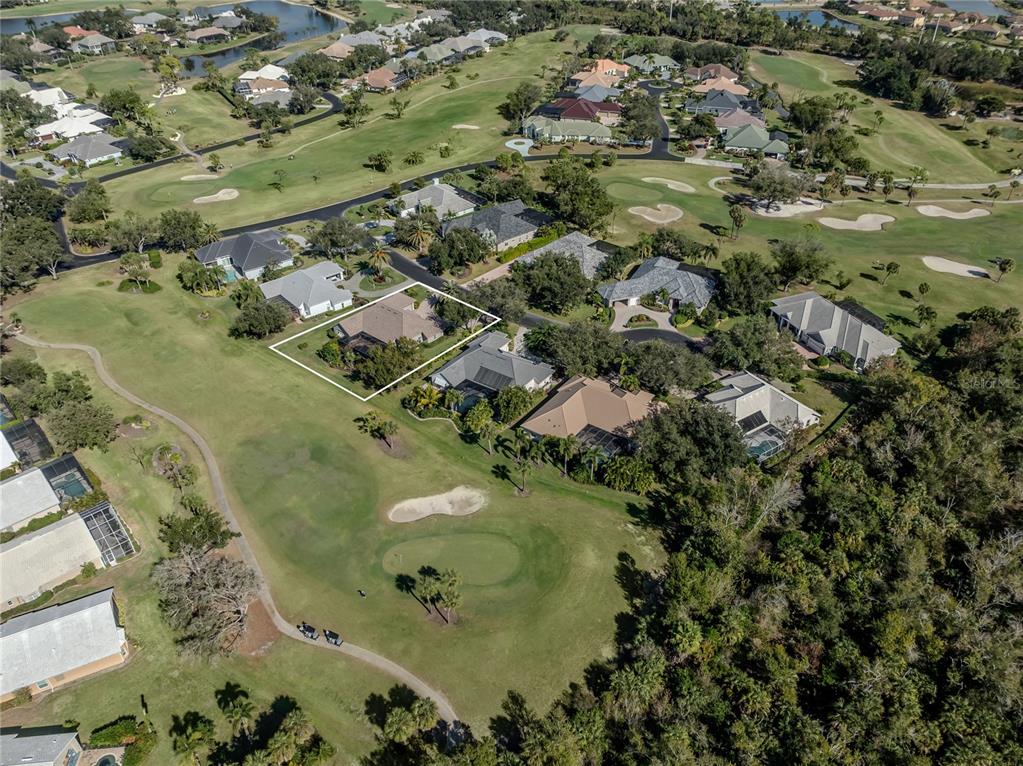 406 Trenwick Lane Venice, FL 34293 - Photo 40 of 60 an aerial view of residential houses with outdoor space