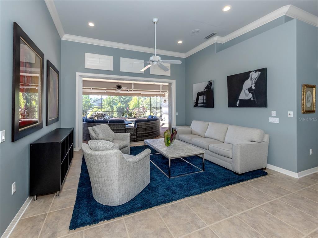 406 Trenwick Lane Venice, FL 34293 - Photo 7 of 60 a living room with furniture and a large window