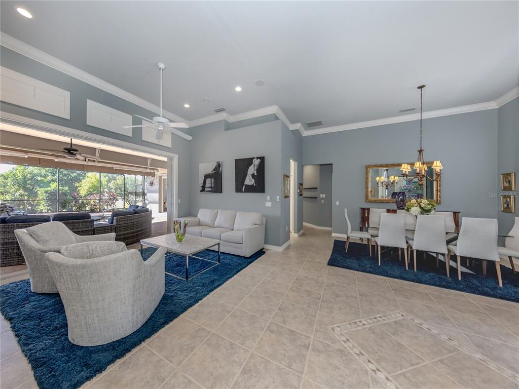 406 Trenwick Lane Venice, FL 34293 - Photo 9 of 60 a living room with furniture and a large window