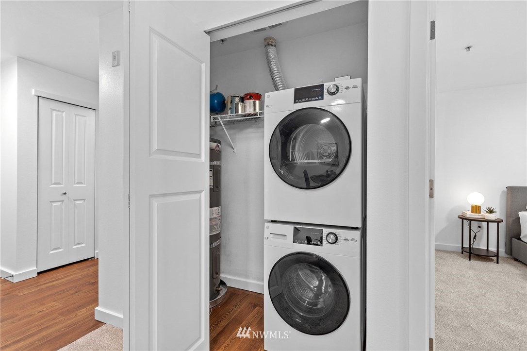 108 5th Avenue South, Unit 710 Seattle, WA 98104 - Photo 11 of 22 a utility room with dryer and washer