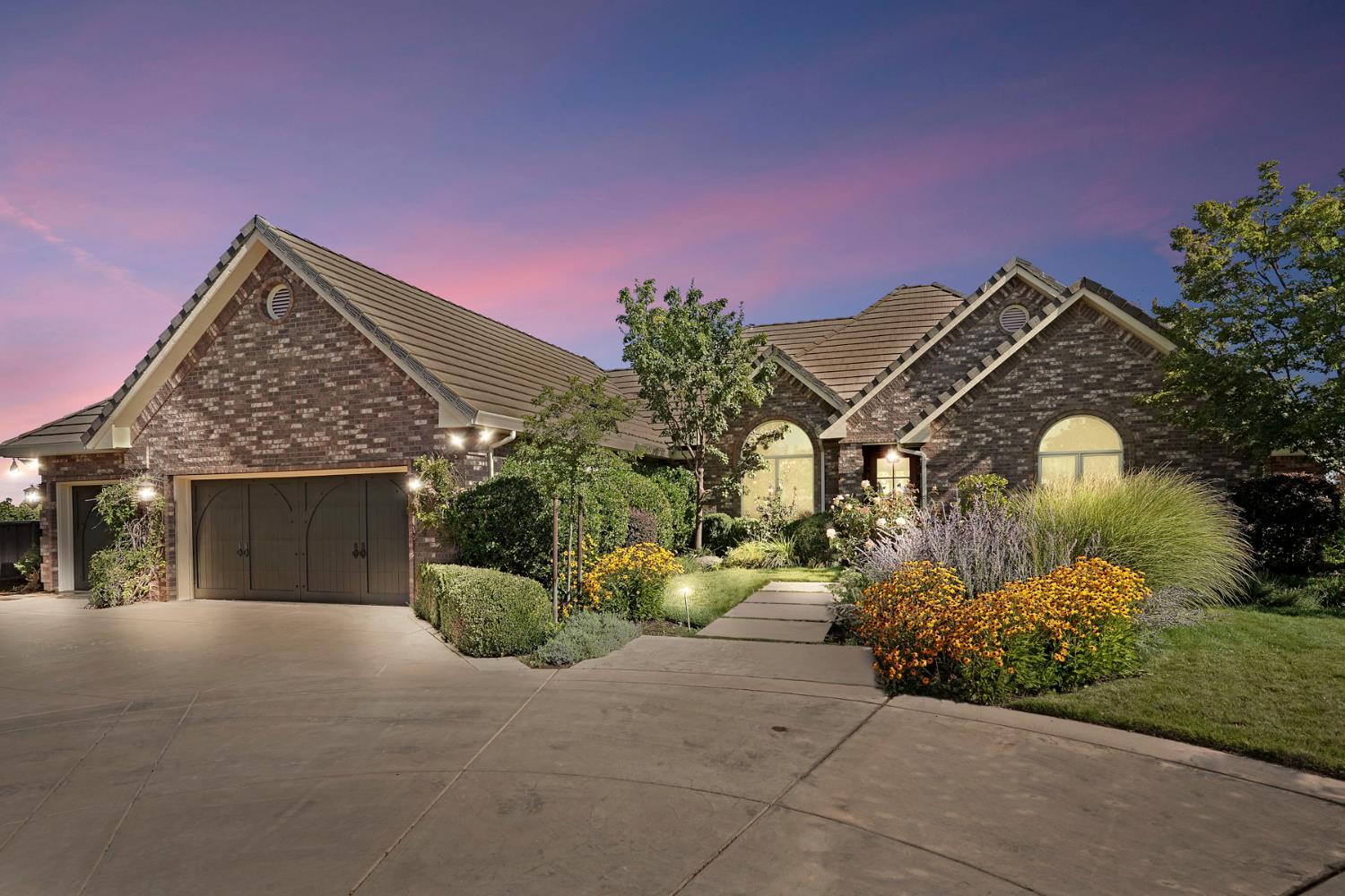 6545 East Peltier Road Acampo, CA 95220 - Photo 1 of 1 front view of a house with a street