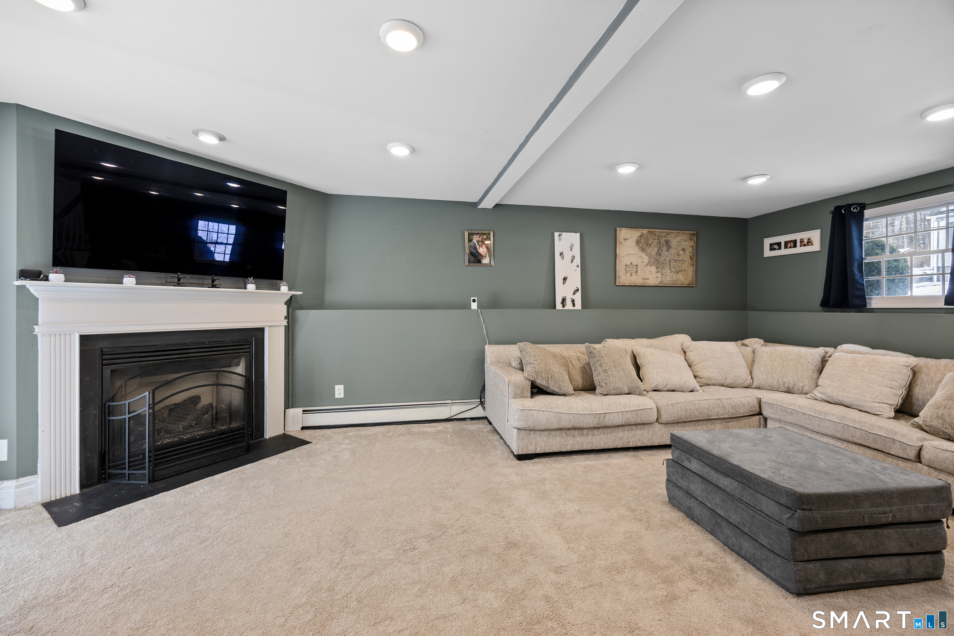 43 Woodycrest Road Meriden, CT 06451 - Photo 20 of 23 Fire Place in Lower Level Family Room