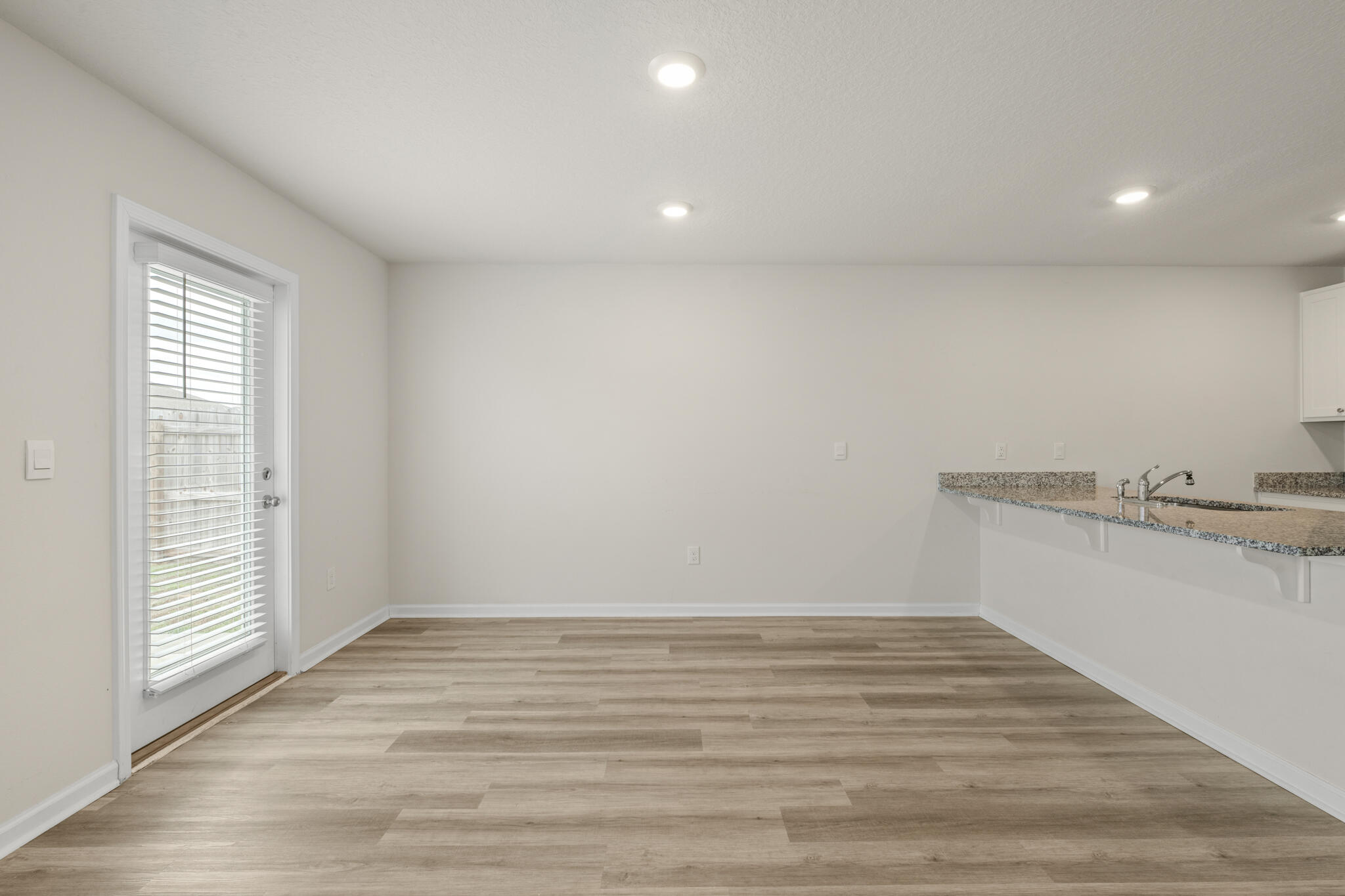 932 Sandbar Loop Crestview, FL 32539 - Photo 13 of 44 a view of room with window and wooden floor