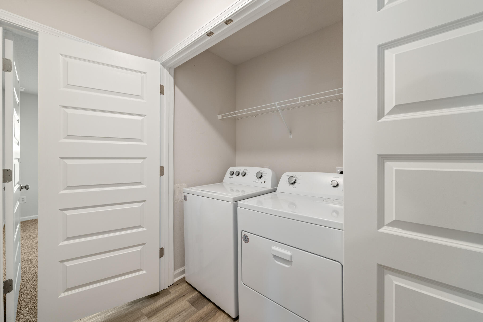932 Sandbar Loop Crestview, FL 32539 - Photo 26 of 44 a view of storage and utility room with washer and dryer