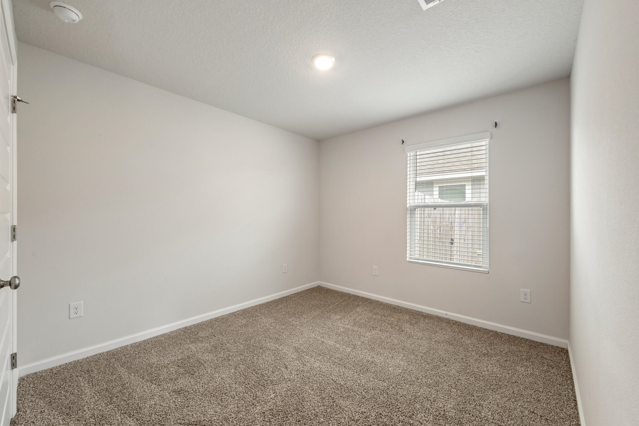 932 Sandbar Loop Crestview, FL 32539 - Photo 29 of 44 an empty room with a window