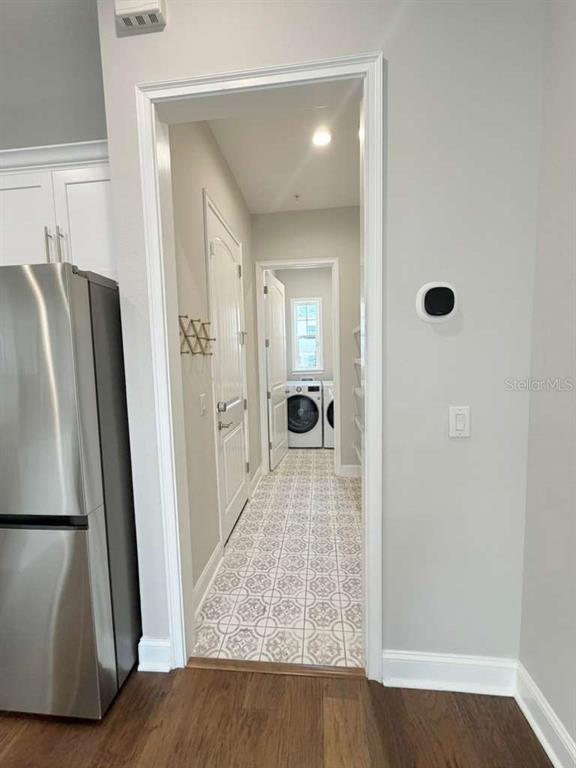 4606 West Fig Street, Unit 2 Tampa, FL 33609 - Photo 11 of 26 a view of a hallway with wooden floor and staircase