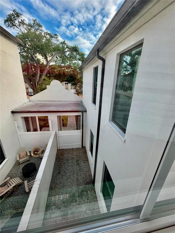 4606 West Fig Street, Unit 2 Tampa, FL 33609 - Photo 24 of 26 a view of a house with a porch