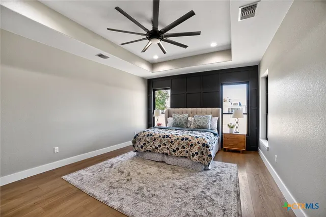 a living room with furniture rug and window