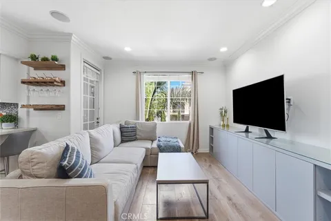 a view of a living room and dining room