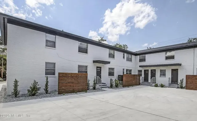 a house view with a outdoor space