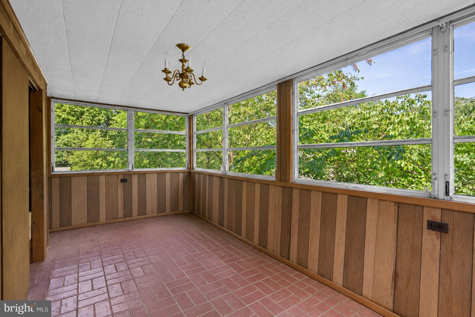 8911 Bradford Road Silver Spring, MD 20901 - Photo 40 of 55 Upper level sunroom virtual