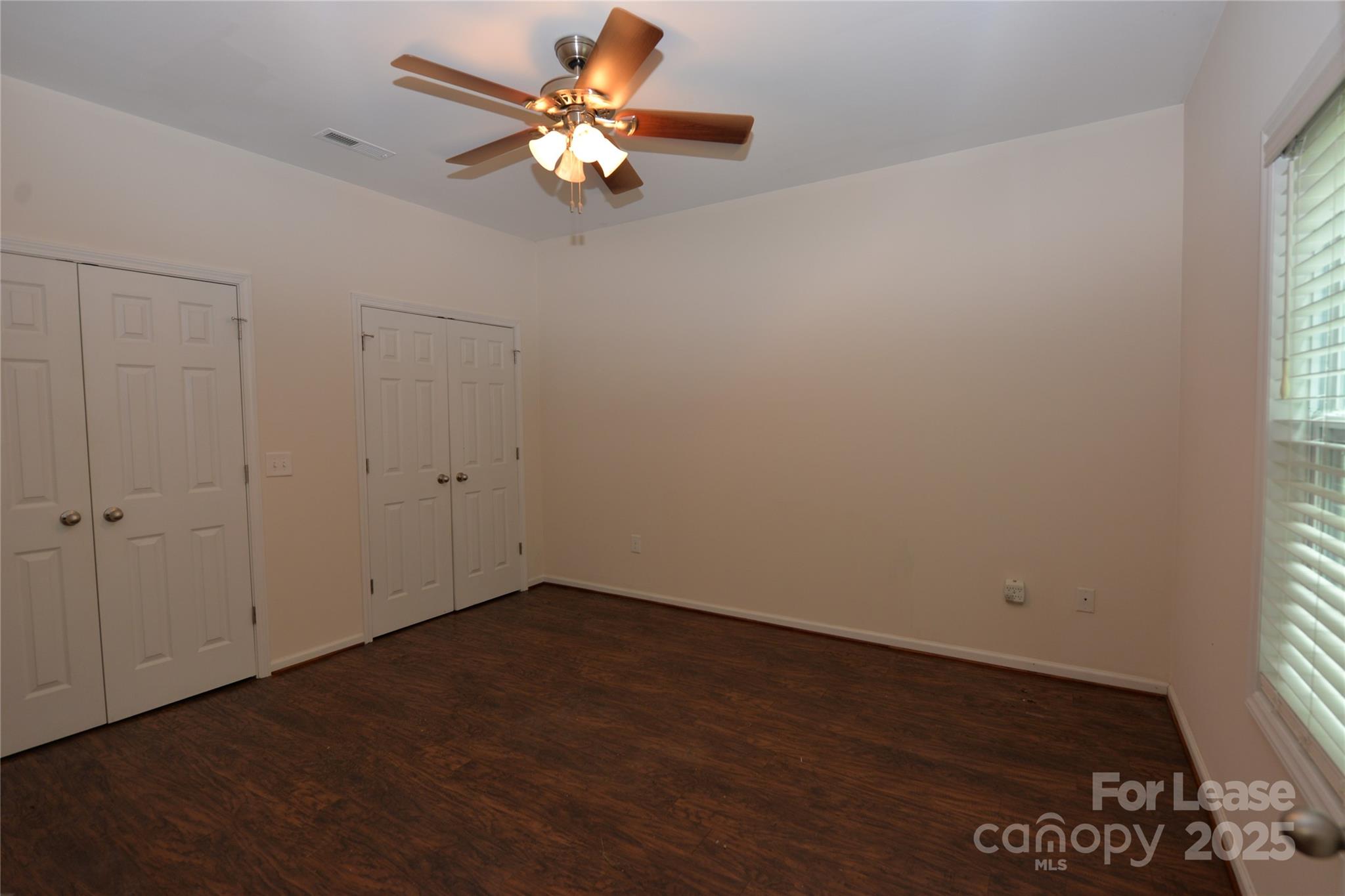 735 Seven Springs Way Denver, NC 28037 - Photo 2 of 11 an empty room with a window
