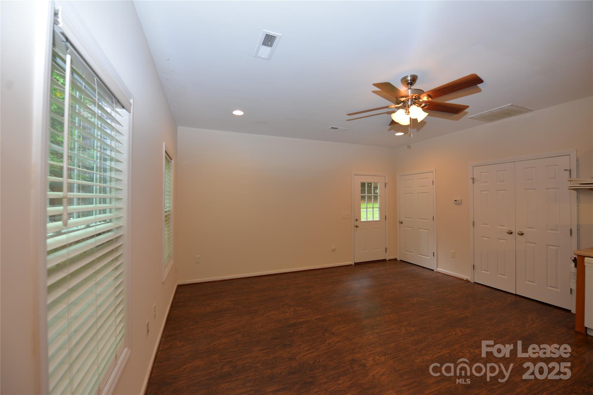 735 Seven Springs Way Denver, NC 28037 - Photo 6 of 11 a view of an empty room with a window