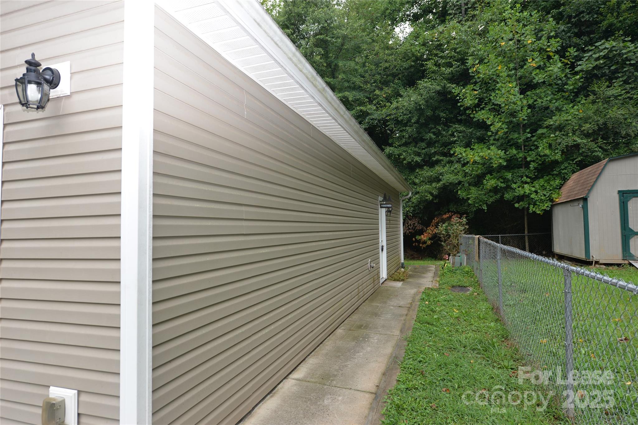 735 Seven Springs Way Denver, NC 28037 - Photo 10 of 11 a backyard of a house with table and chairs