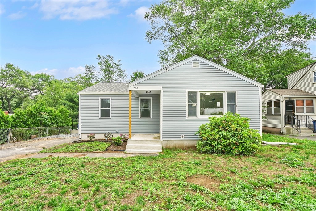 738 Piper Road West Springfield, MA 01089 - Photo 1 of 24 a view of a house with a yard and potted plants